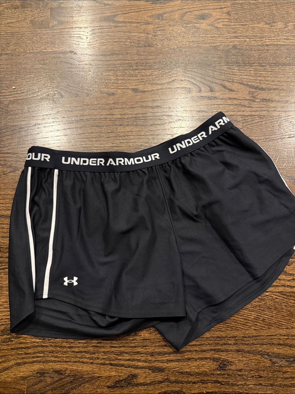 Under Armour Black Women’s Athletic Shorts with White Trim with pockets large